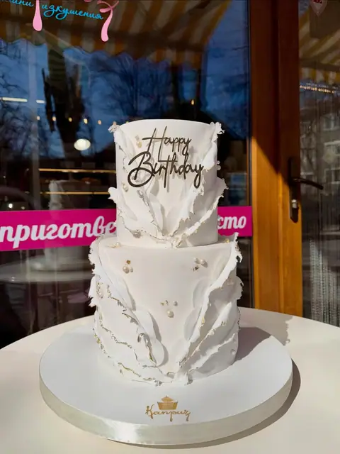 Milestone birthday cakes › For her — fondant, 50 servings